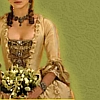 princesse_incongrue: an 18th century robe à la française in gold silk, its wearer clutching a thick bouquet (Default)