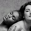 erotic_fic: A naked black woman with eyes shut leaning against a white woman's back (pic#5886714)