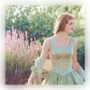 grey_gazania: a red-haired woman in a blue gown in front of pink flowers (when will you ever learn?)