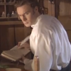 but_civilization: (looking over shoulder with book)