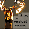 snow: Text: I'm a rocket man, Image: Young woman holding fire on a stick. (Hell yes: fire)