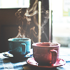capn_mactastic: two steaming teacups (cups)