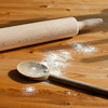 angrboda: .A rolling pin and a stirring spoon with a sprinkle of flour. (Baking)