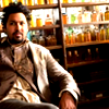 zanzando: Yusuf sitting in a chair. (Chemist of Awesome)