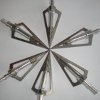 death_gone_mad: Broadheaded arrowheads, arranged in a six-pointed star pattern (broadheads)