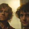 pro_patria_mortuus: Enjolras and Grantaire, standing together, proudly staring into the camera (at a firing squad) (Orestes sober & Pylades drunk)