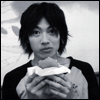 storme: image of a man eating a hamburger (Genki nom)