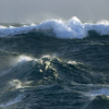 with: A photograph of roiling ocean waves. (ocean waves)