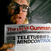 esteefee: one of the lone gunman from xfiles holding up newspaper about teletubbies using mindcontrol (teletubbies)