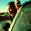 chalcopyrite: Young girl leaning out the window of a car with her arms up \o/ (bandom: killjoys make some noise)