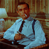 meloukhia: Sean Connery as James Bond, wearing a white shirt and tie, a cigarette dragging from his lip, pointing a gun. (James Bond)