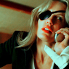 meloukhia: Elle Driver from 'Kill Bill.' She is a blonde woman wearing an eyepatch and talking on a cell phone. (Elle Driver)