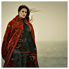 mythochromos: a brown-haired woman by the sea (kearil - red jacket)