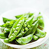 meloukhia: A bowl of English peas, partially shelled (Peas!)