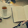 meloukhia: An open book with a cup of tea next to it (Tea and a book)