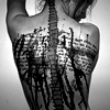 meloukhia: A person's back, spine outlined, and smeared with paint and text. (Spine)