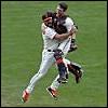 frausorge: Brian Wilson and Buster Posey leaping and hugging midair (hello win column)