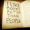 tree: handwriting overlaying the page of a book that says "i like books better than people" ([else] an unreliable narrator)