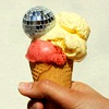 inauthenticcooking: Icon of a hand holding a triple scoop cone of ice cream: vanilla (white), fruit (red), and then a small disco ball (Default)