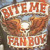 zellieh: Image of the words 'bite me fanboy' with a winged skull (activism: sexism bite me fanboy)