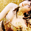automaticdoor: zooey deschanel lying in a field (dreamy zooey in a field)