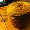 northern: a cake of golden fingering weight yarn (yarn things yellow)