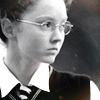 language_escapes: Polly of St. Trinian's looking to the right (Polly)