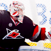 hockeyficrecs: picture of cam ward, goalie for the carolina hurricanes, making a glove save. (Default)
