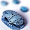 treefrog: a blue egyptian scarab (Scarab)