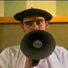 taeli: Julian Barratt from Asylum with a megaphone ([tmb] announcement)