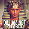 musyc: Ramses from "Ten Commandments" movie, looking annoyed, captioned "Oh, I am not pleased" (Film: Ramses unpleased)