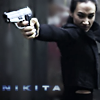 copracat: Nikita pointing a very large gun (nikita)