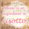 vass: Sheet music with rice scattered on top: caption "Music is an ingredient in risotto" (Risotto)