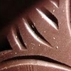 rydra_wong: Close-up of the moulded design on a bar of Grenada Chocolate Company chocolate. (food -- grenada chocolate)