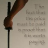 silveraspen: man's hand holding a sword with wheel of time quote caption (wot: the price worth paying)