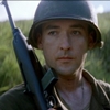 hecu_marine: John Cusack in WW II US Army fatigues and helmet, holding a rifle, looking unimpressed (carbine)