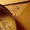 meloukhia: A magnifying glass lying on some text (Magnified text)