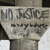 meloukhia: Graffiti reads 'no justice anywhere' (No justice)