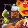 cinco: Kermit and Fozzie behind a steering wheel with the text "Moving right along." (movies: kermit and fonzie move along)