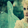 elaineofshalott: Photo of half of a fairy's face. She has heavy eye makeup. Her wings appear in the background. (wish)