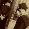 elaineofshalott: Robert Downey Jr. (Holmes) and Jude Law (Watson) hide their faces with hats in black and white photo. (hide me)