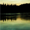 kohikari: bright clouds silhouetting the forested skyline, and reflecting on a still lake (mirror)