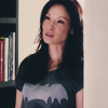venusinthenight: joan watson, in a designer batman t-shirt, leaning in a door frame (elementary - joan leans in doorway)