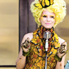 Effie Trinket : Escort for District 12