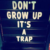 alwayswondered: Text: "Don't grow up, it's a trap". (on the bad side of 25)