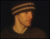 josephine_marrs: Colin Morgan wearing a dark-colored beanie, apparently at night (pic#7225151)