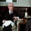 mightthinkthat: Francis sits next to a table with a drink and food in hand (conversation)