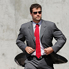 frausorge: Patrick Marleau in a gray suit, red tie, and sunglasses (wherever he swims)