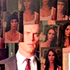 veleda_k: Neal from White Collar looking into Rebecca's mirror, which is covered with pictures of her (White Collar: Neal/Rebecca mirror)