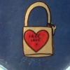 lilliburlero: street art, closed padlock with heart, reading "free love" (free love)
